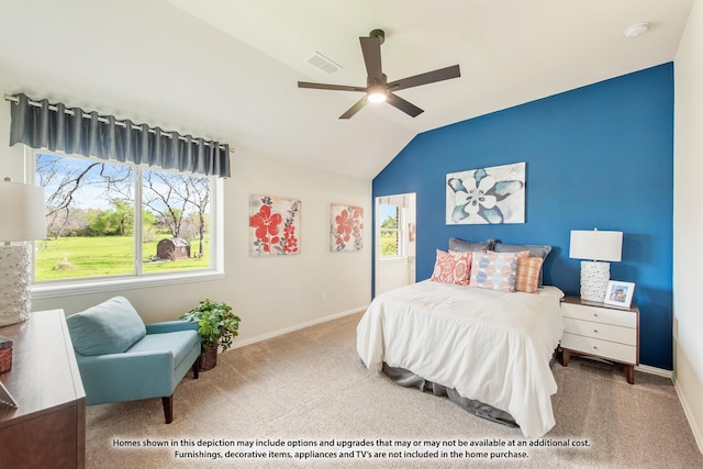 carpeted bedroom featuring ceiling fan and vaulted ceiling