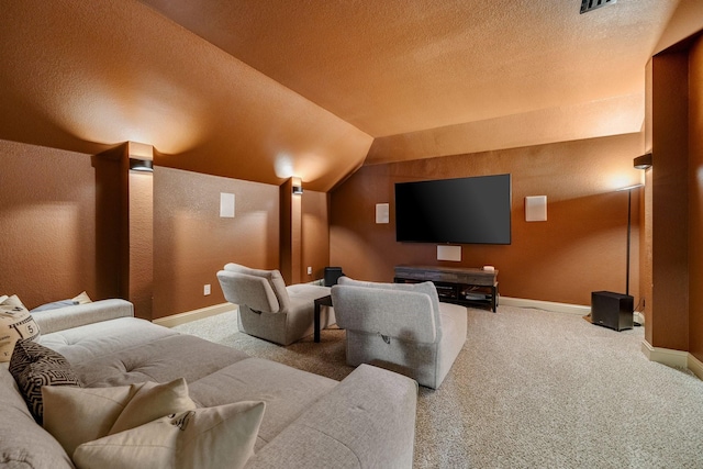 home theater room with carpet flooring and lofted ceiling