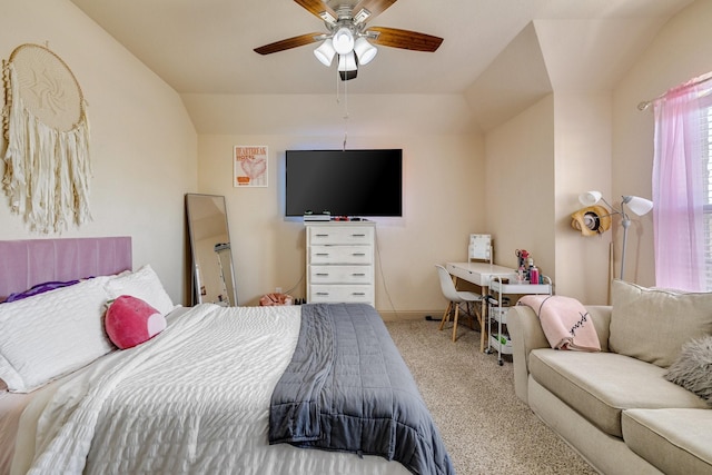 carpeted bedroom featuring ceiling fan and lofted ceiling