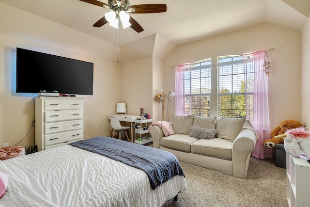 bedroom featuring ceiling fan, light colored carpet, and vaulted ceiling