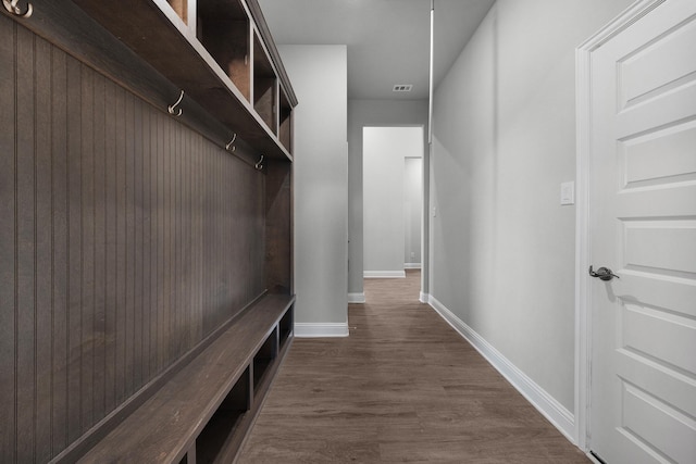 mudroom with dark hardwood / wood-style flooring