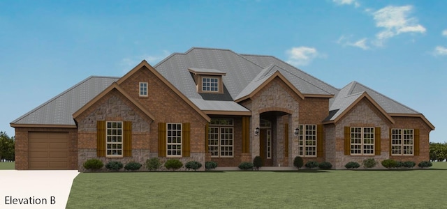 view of front of home with a garage and a front lawn