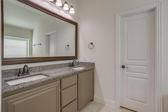 bathroom featuring tile patterned floors and vanity