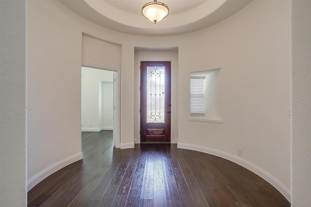 entryway with dark hardwood / wood-style floors