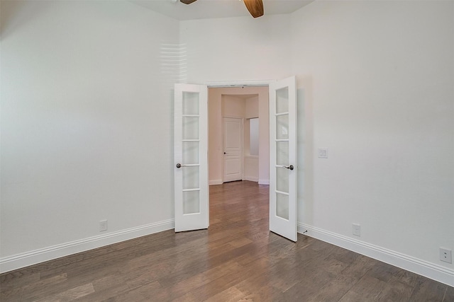 unfurnished room featuring ceiling fan, french doors, and dark wood-type flooring