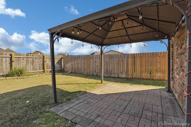 view of patio featuring a gazebo