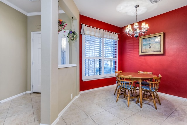 dining space featuring a chandelier, light tile patterned floors, and ornamental molding