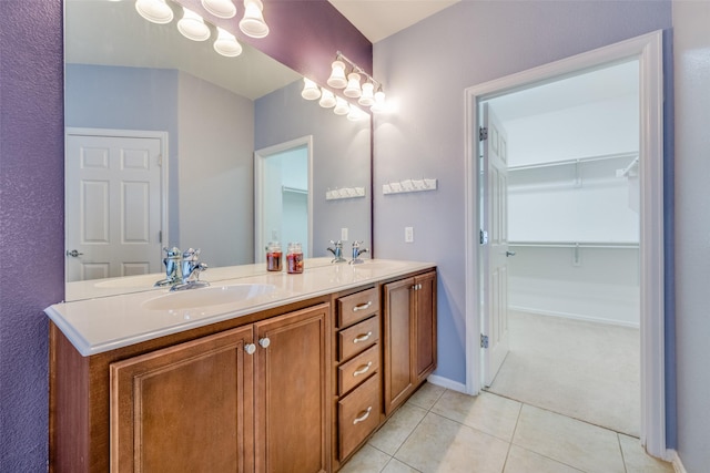 bathroom featuring tile patterned floors and vanity