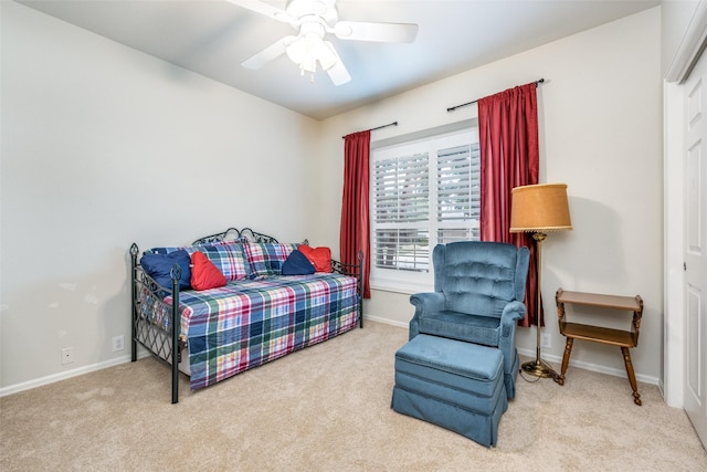 bedroom with ceiling fan and light colored carpet