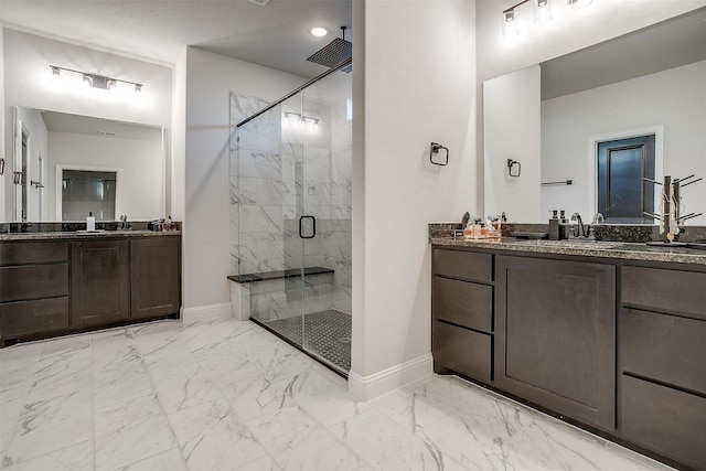 bathroom with vanity and walk in shower