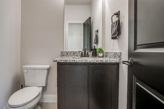 5214 Rowlan Row, Midlothian, TX 76065 - bathroom with vanity and a textured wall