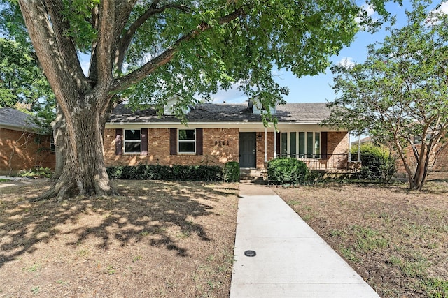 single story home with covered porch