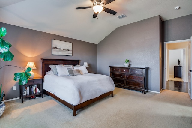 bedroom featuring light colored carpet, ceiling fan, and lofted ceiling