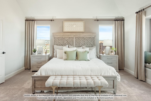 bedroom with light colored carpet, vaulted ceiling, and multiple windows