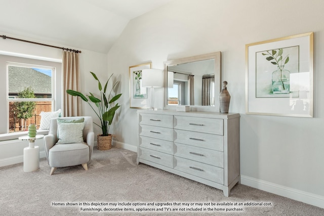 living area featuring light colored carpet and vaulted ceiling