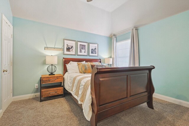 bedroom featuring light carpet