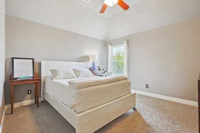 carpeted bedroom featuring ceiling fan and lofted ceiling