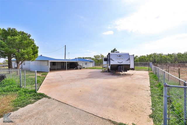 view of yard with a carport