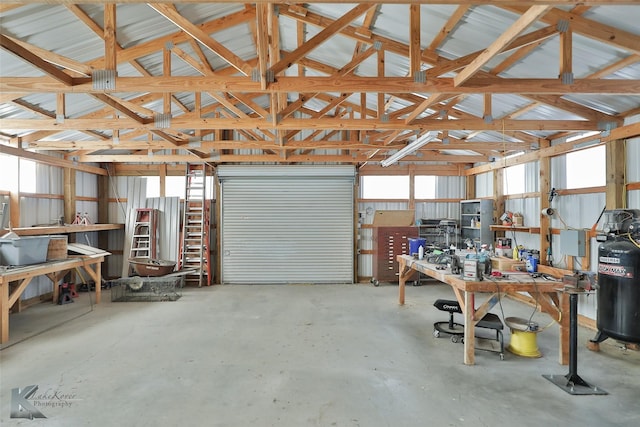 garage featuring a workshop area