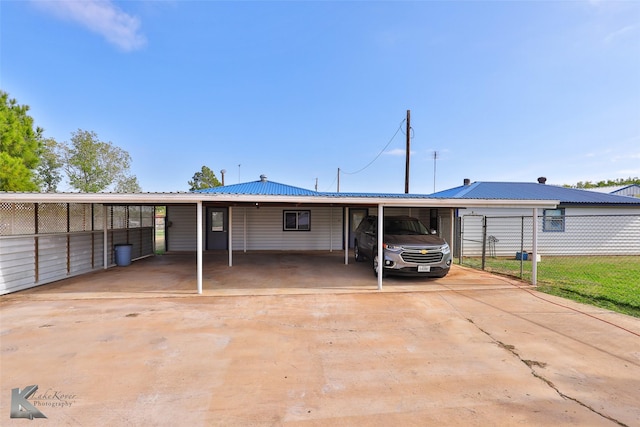 view of front of house with a carport