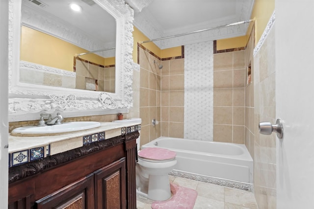 full bathroom with ornamental molding, vanity, tiled shower / bath combo, tile patterned flooring, and toilet