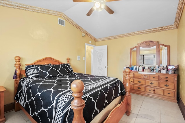 tiled bedroom featuring ceiling fan and vaulted ceiling