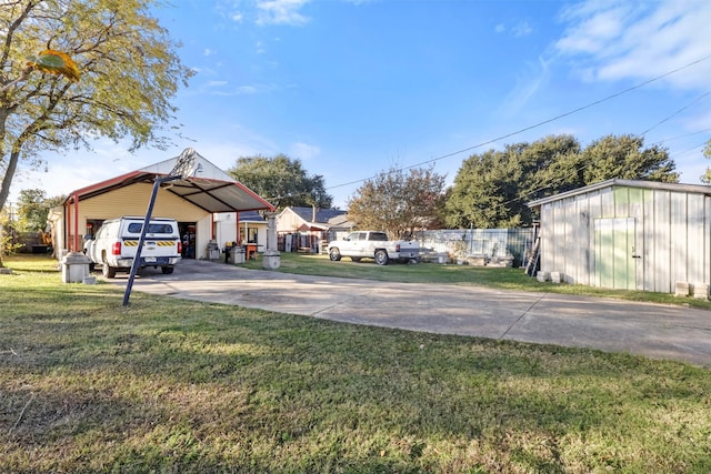 view of yard with a carport