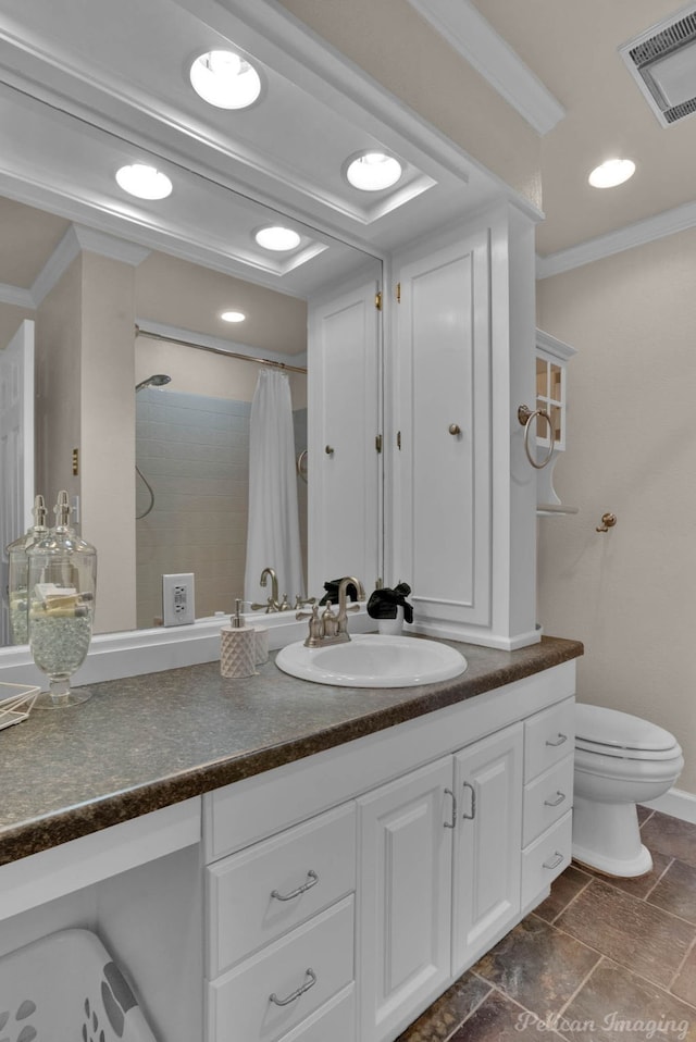 bathroom featuring a shower with curtain, crown molding, vanity, and toilet