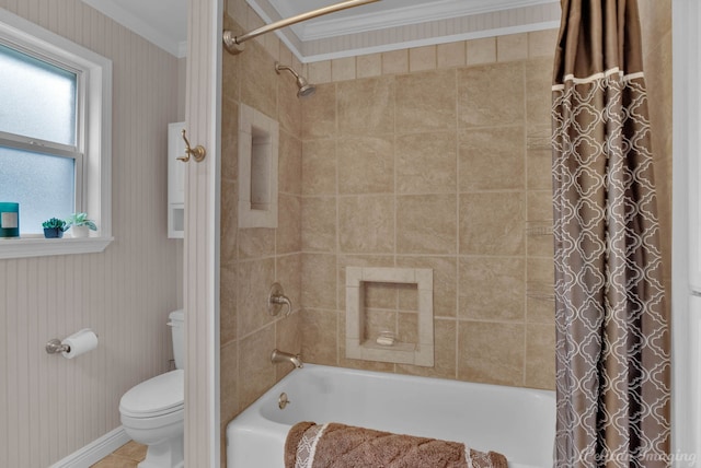 bathroom featuring crown molding, shower / bath combo, and toilet