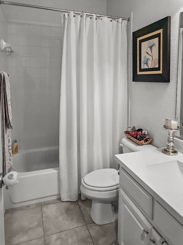 full bathroom with toilet, tile patterned floors, vanity, and shower / tub combo with curtain