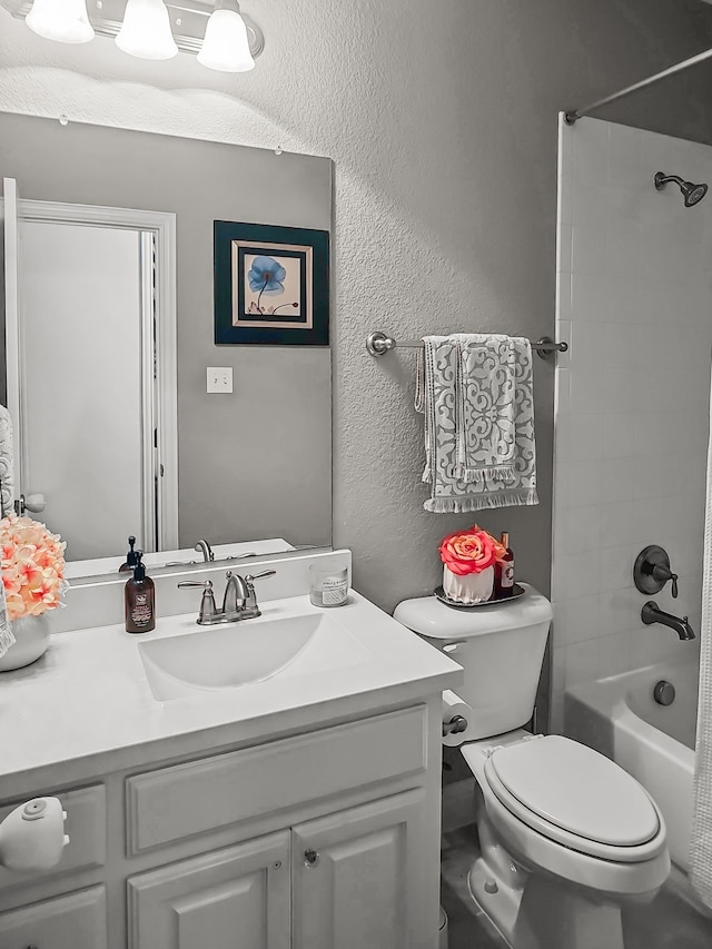 full bathroom with vanity, toilet, and shower / bath combo with shower curtain