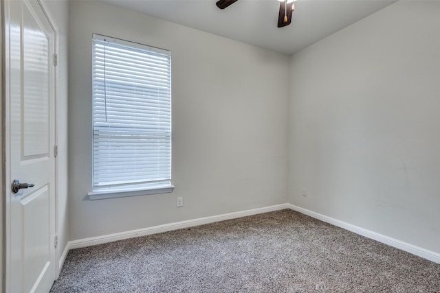 carpeted empty room with ceiling fan