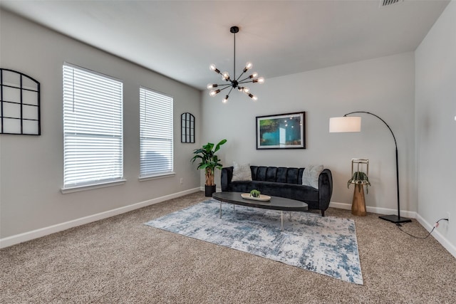 living area featuring carpet flooring and a notable chandelier