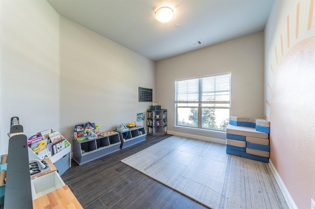 game room featuring dark hardwood / wood-style flooring