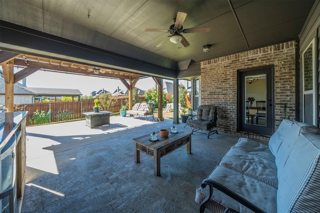 view of patio featuring an outdoor hangout area and ceiling fan