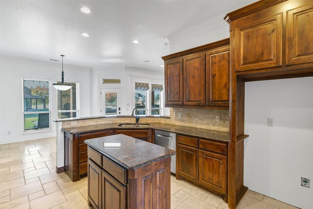 kitchen with stainless steel appliances, dark stone counters, a kitchen island, custom range hood, and ornamental molding