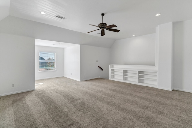 additional living space featuring recessed lighting, carpet floors, visible vents, baseboards, and vaulted ceiling