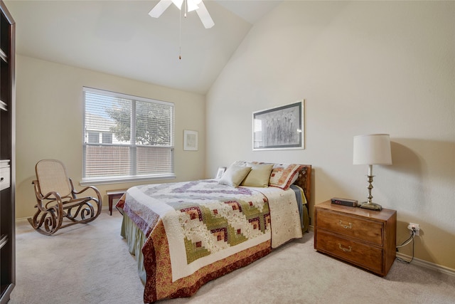 bedroom with light carpet, high vaulted ceiling, and ceiling fan