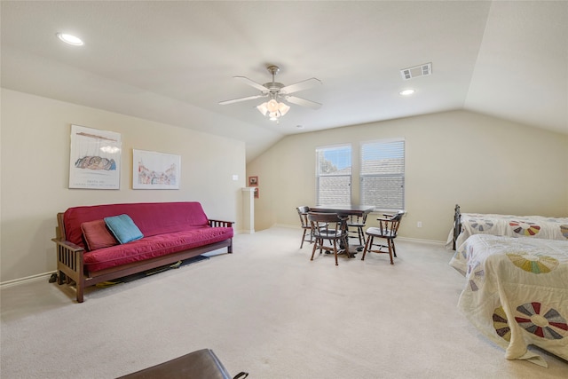 carpeted bedroom with ceiling fan and lofted ceiling