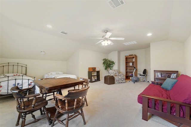 bedroom with ceiling fan, carpet, and lofted ceiling