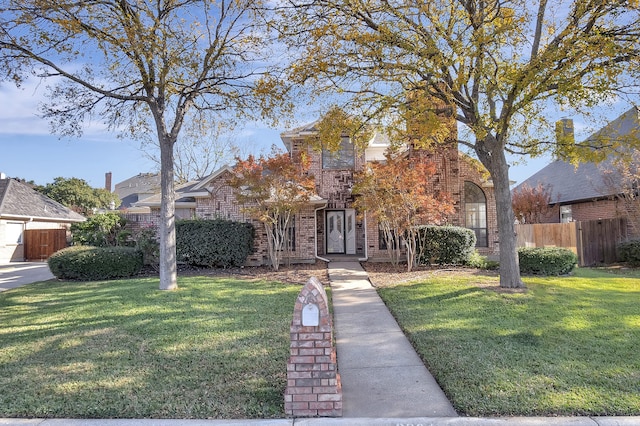 view of front of house with a front lawn