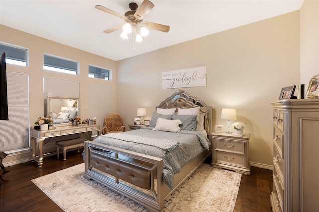 bedroom with ceiling fan and dark wood-type flooring