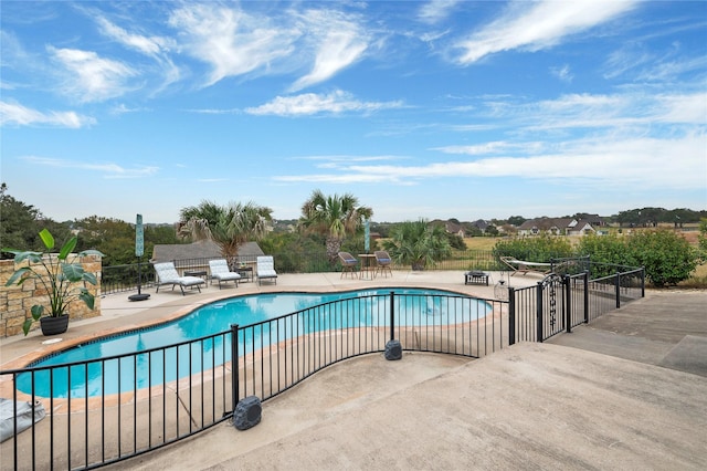 view of pool featuring a patio area