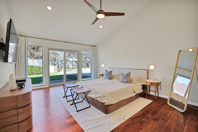 bedroom with access to outside, dark hardwood / wood-style floors, high vaulted ceiling, and ceiling fan