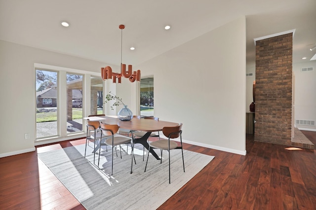 dining space with dark wood-type flooring