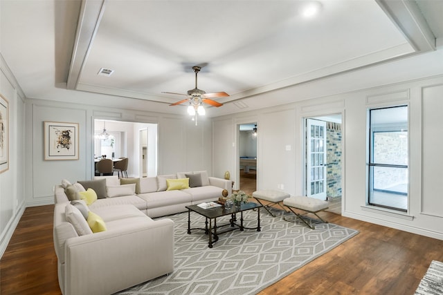 living room featuring dark hardwood / wood-style floors and ceiling fan