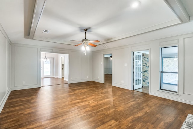 empty room featuring ceiling fan and dark wood-type flooring