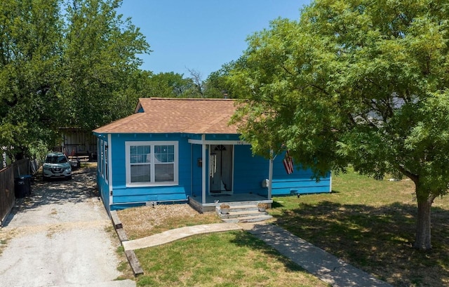 bungalow with a front lawn