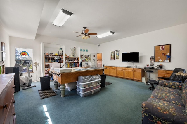 carpeted living room with ceiling fan