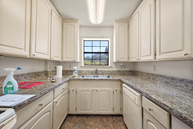 kitchen featuring a textured ceiling, dishwasher, range, and sink